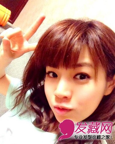 陈妍希齐刘海扮嫩 包子脸变瓜子脸
